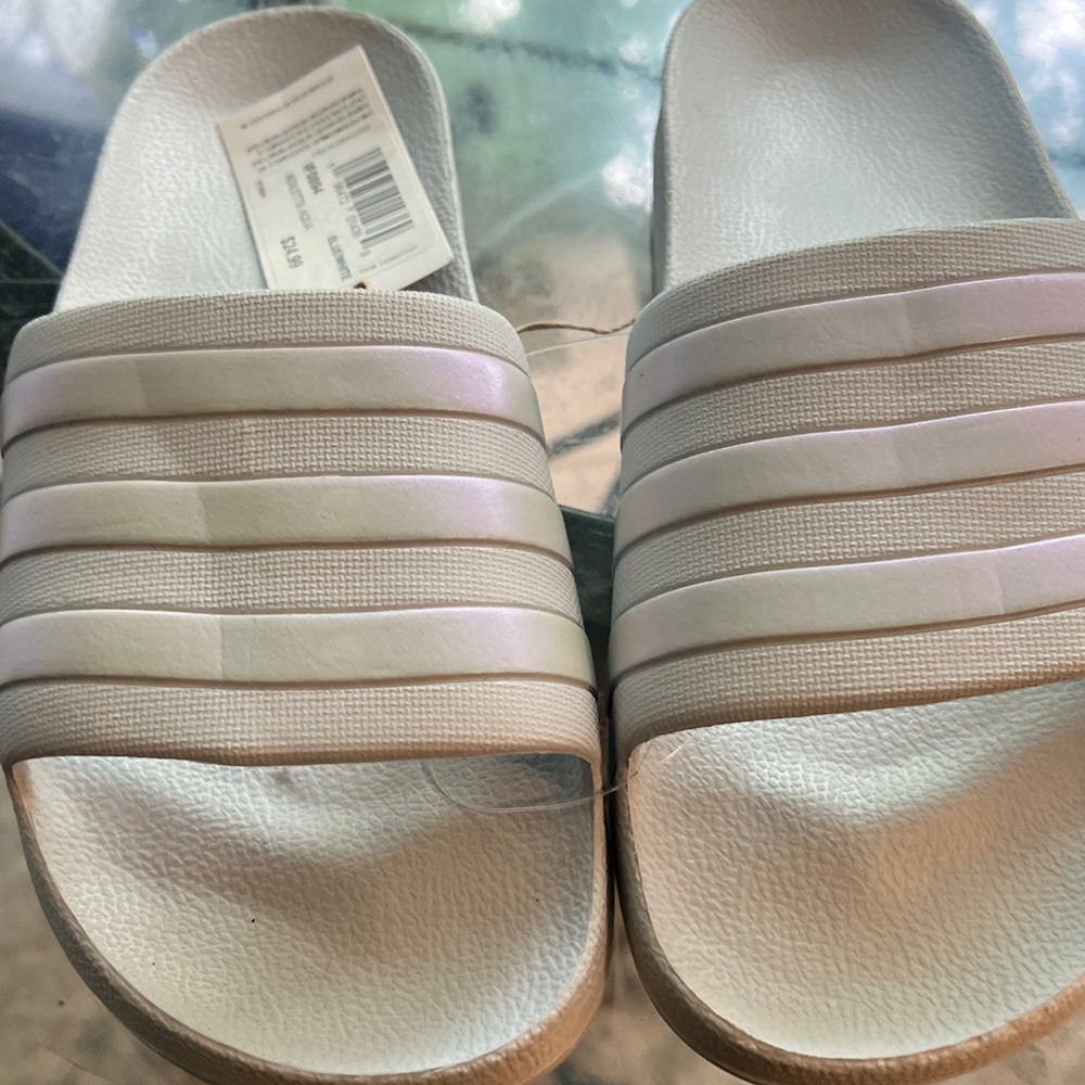 adidas Women's Adilette  $24.95 Slide Sandals in Light Blue
